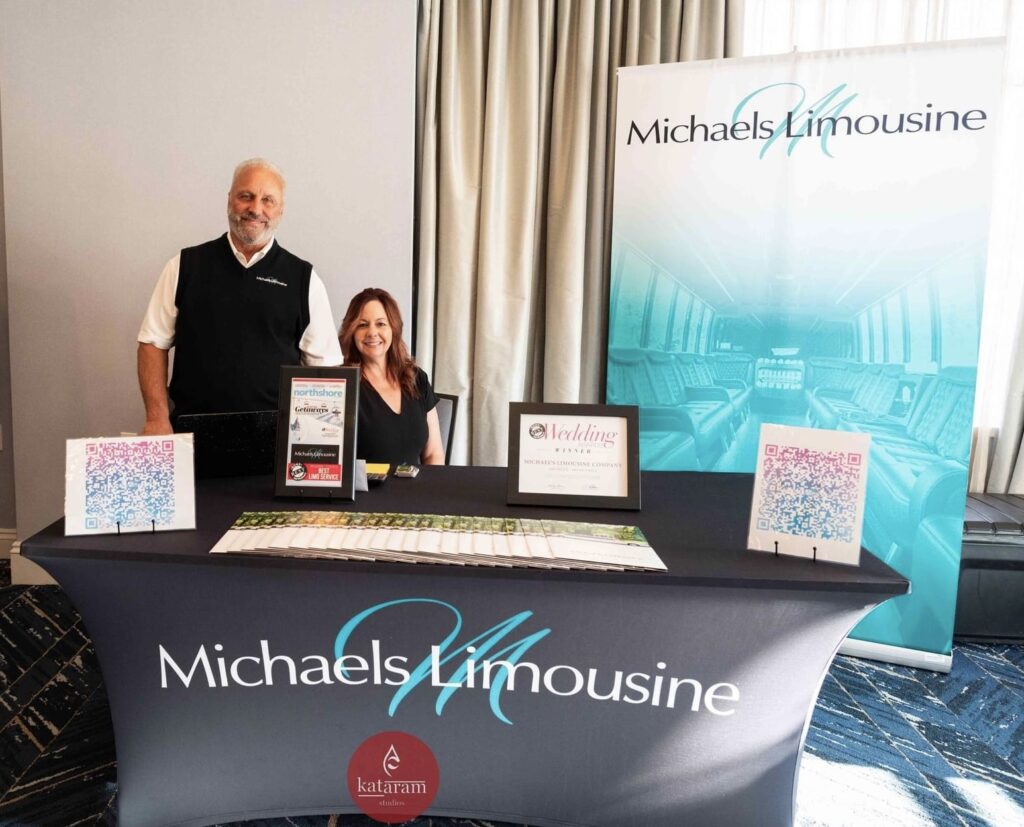 Michael and Renee Kostopoulos at a promotional booth